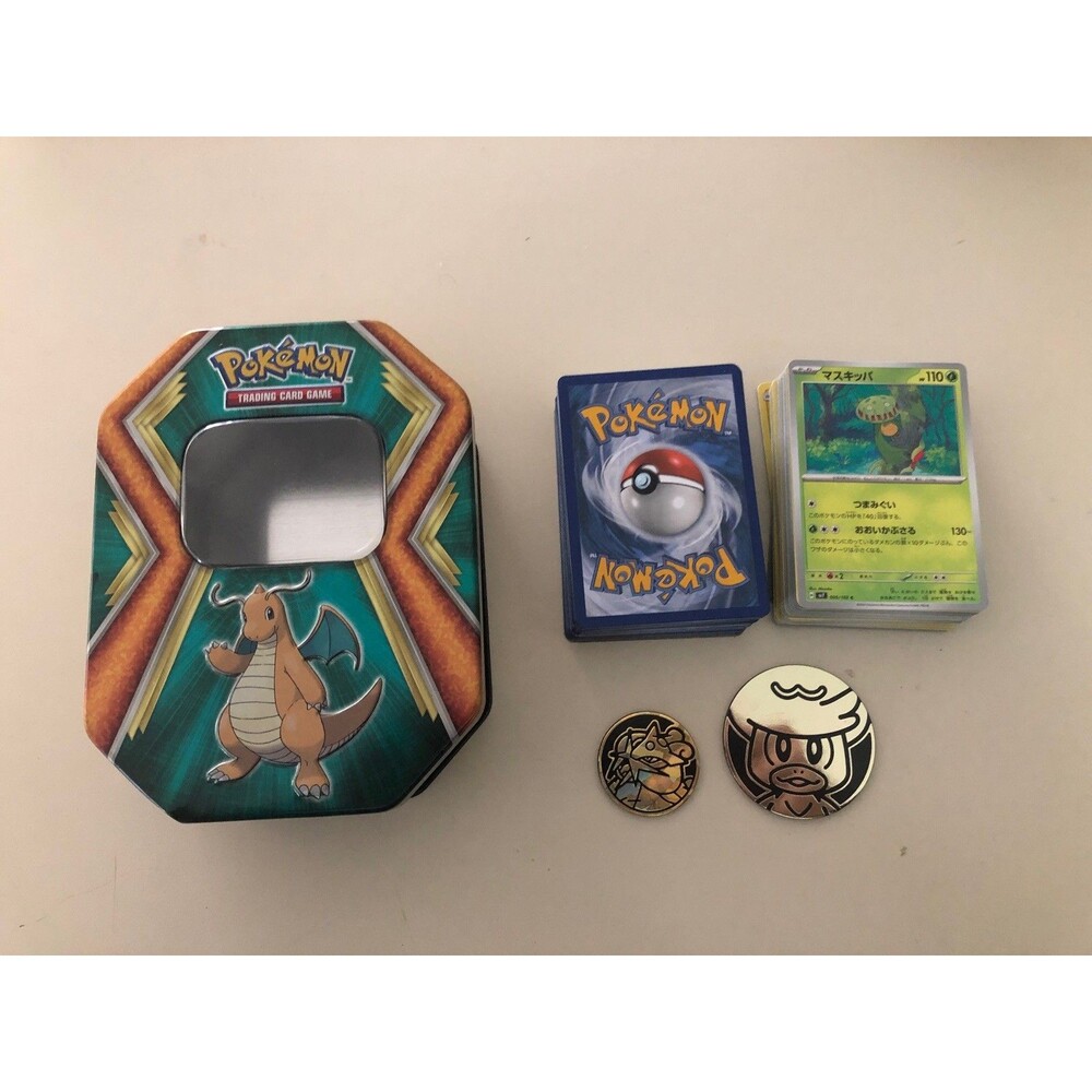 Pokemon TCG Dragonite Promo Tin with 140 cards and Quaxly and Raikou Coins